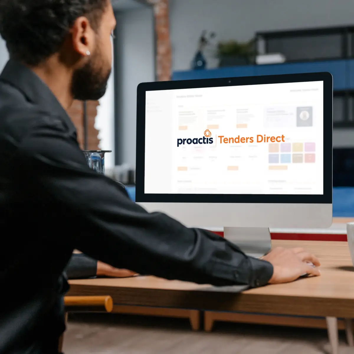 Person viewing tailored tender opportunities on Tenders Direct dashboard on a laptop